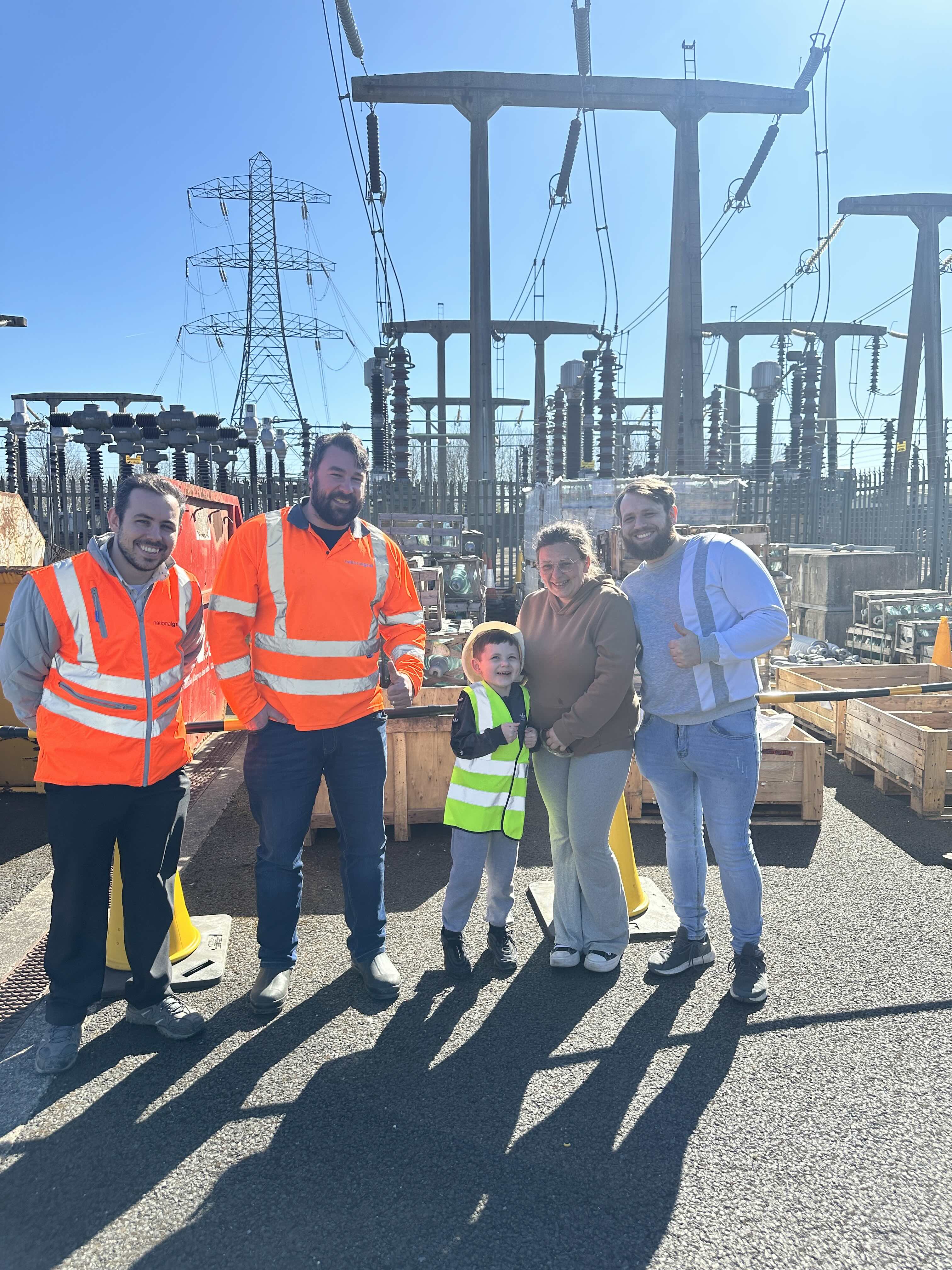 Ted with his parents and National Grid team members