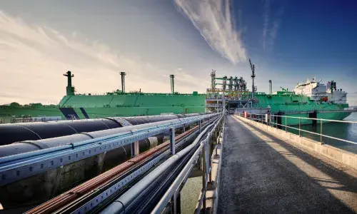 Ship docked at the end of the jetty at the Grain LNG terminal in Kent