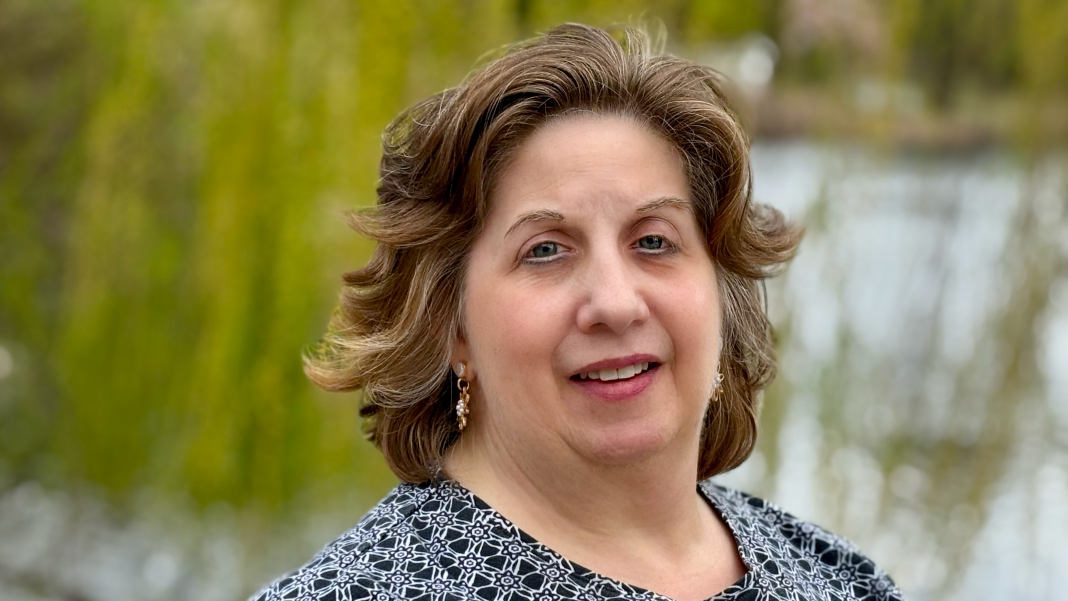 Portrait of National Grid Foundation NY Communication Lead/Editor Christine A. Berardi